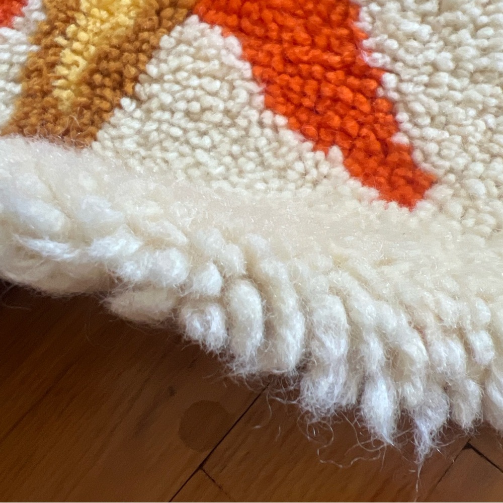 Round Wool Rug with Starburst Design - Picture 9 of 10